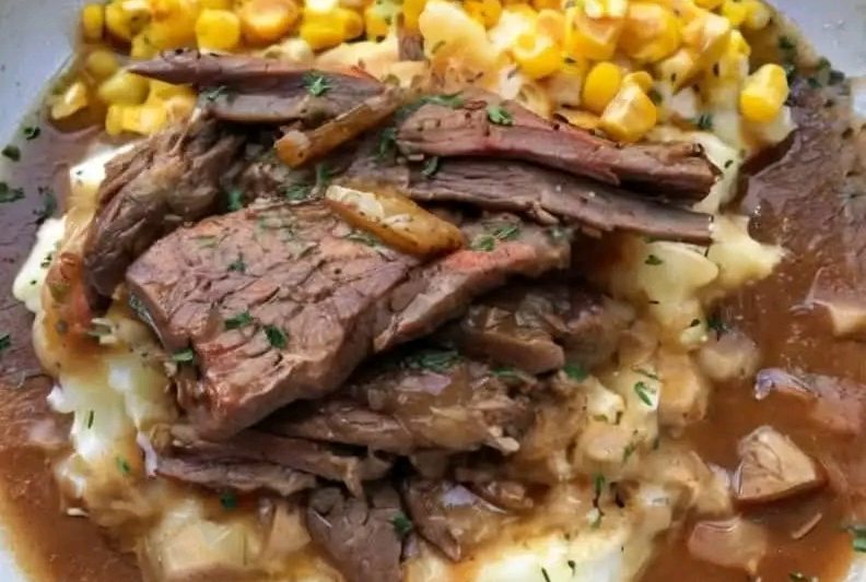 Tender Pot Roast with Mashed Potatoes and Corn