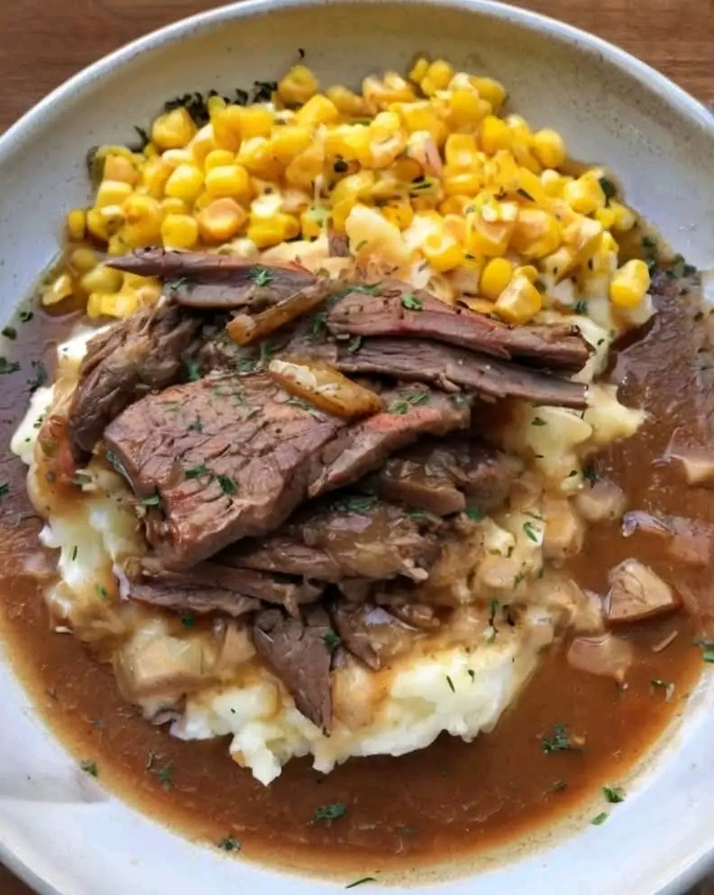 Tender Pot Roast with Mashed Potatoes and Corn